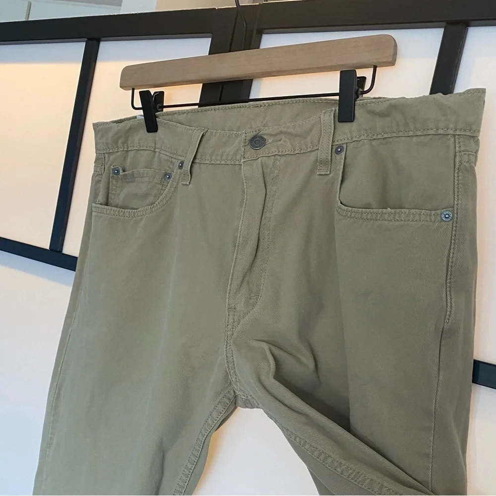 Levi's 502 tan pants. Size 36. HEMMED‎